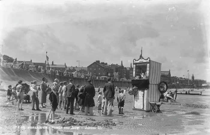 Framed Print : Punch and Judy Show at the Beach
