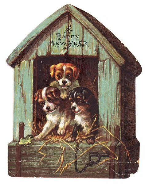 Three puppies on a kennel-shaped New Year card
