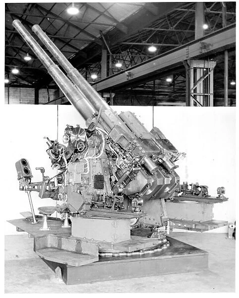 QF 4-inch naval gun Mk XVI on a twin HA  /  LA mount