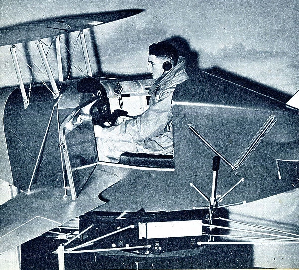 RAF cadet learning on a link trainer, WW2