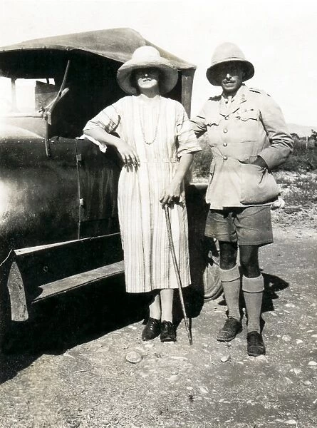 RAF officer and wife with car, Middle East