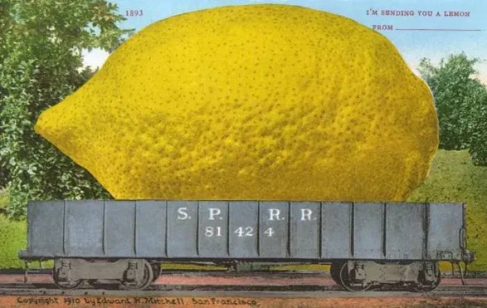 Framed Print : Rail car transporting a giant lemon Framed Print : Rail car transporting a giant lemon