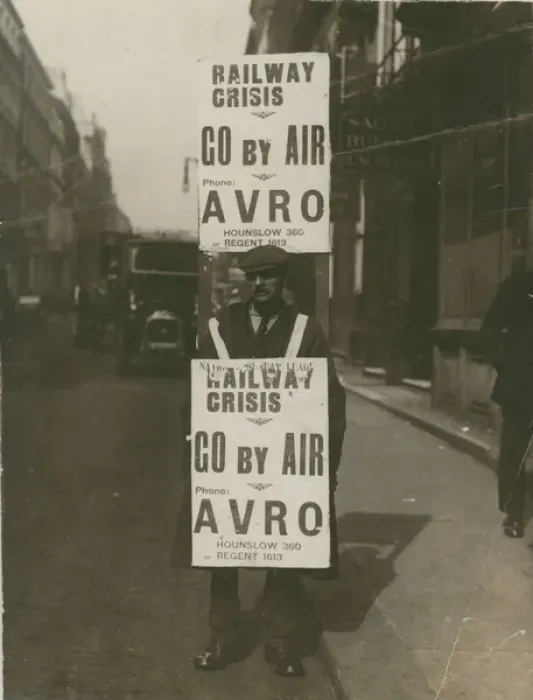 Framed Print : Railway crisis, go by air Phone Avro Sandwich board man Framed Print : Railway crisis, go by air Phone Avro Sandwich board man