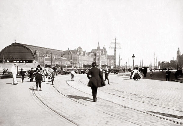 Railway station, Amsterdam, 1890s. Date: 1890s