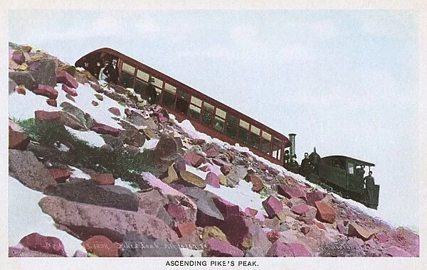 Railway train ascending Pikes Peak, Colorado, USA