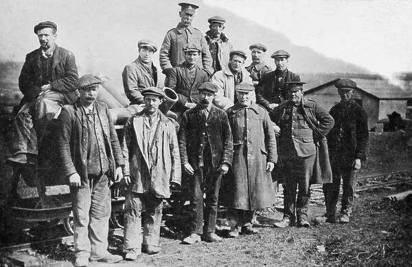 Railway workers stop for a group photograph