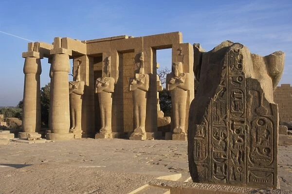 Rameseum. Pillars with osirian statues. Egypt