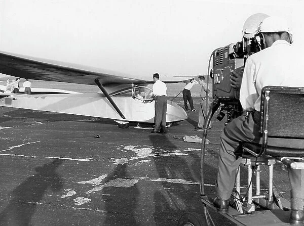 Raymond Baxter being filmed in a Slingsby T. 21 glider