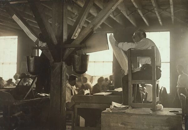 A Reader in cigar factory, Tampa, Fla. He reads books and ne