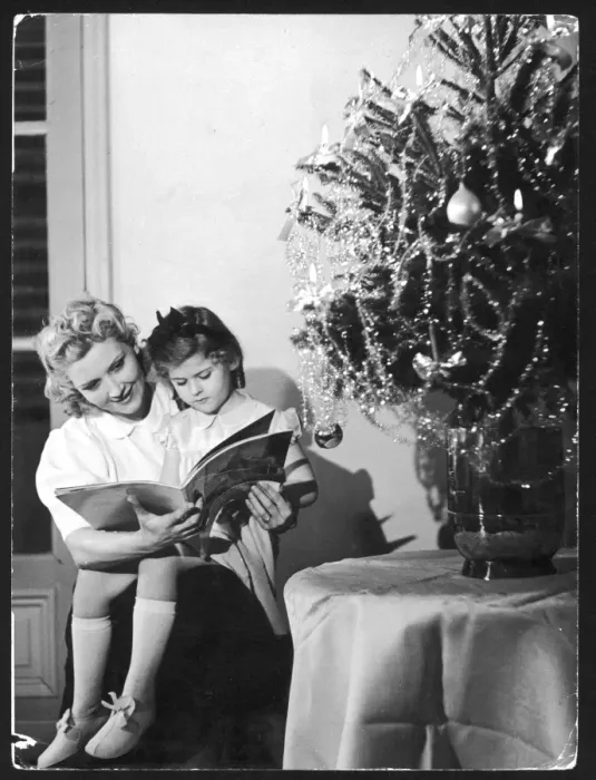 Framed Print : Reading under C mas Tree Framed Print : Reading under C mas Tree