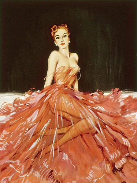 Red-headed girl seated in a sheer red dress