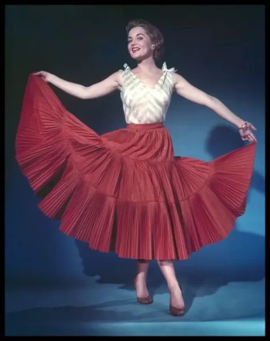 Framed Print : RED SKIRT. She holds out her red full circle skirt Framed Print : RED SKIRT. She holds out her red full circle skirt