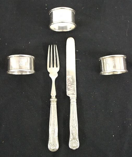 Red Star Line - three metal napkin rings, knife and fork