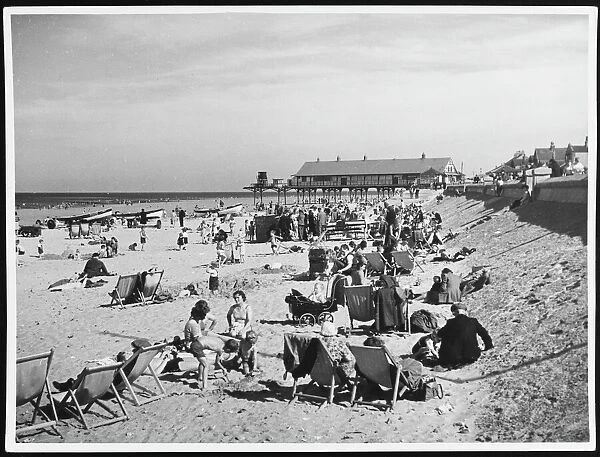 Redcar Beach 1950S. Lots of deckchairs and families with young children
