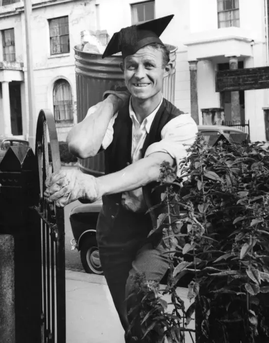 Framed Print : Refuse collector at work on a Balham street, SW London Framed Print : Refuse collector at work on a Balham street, SW London
