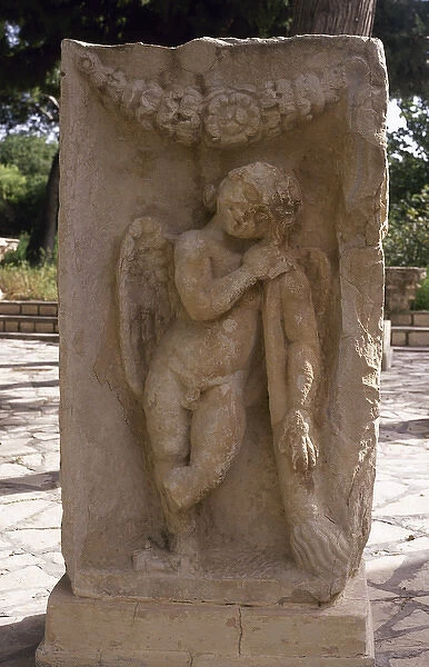 Relief of Cupid with torch burning passion. Roman Art. Makta