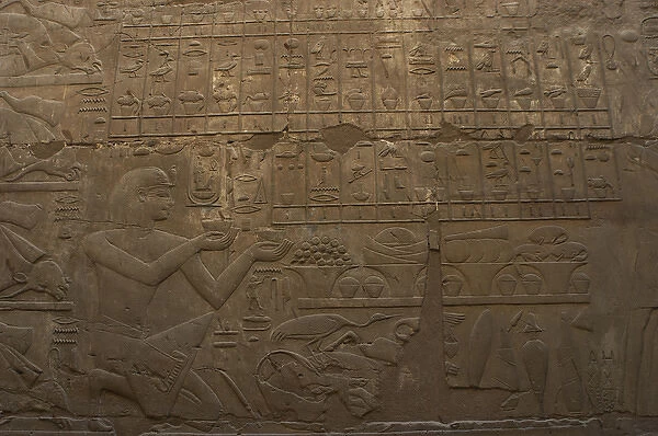 Relief depicting a pharaoh making an offering to the Gods