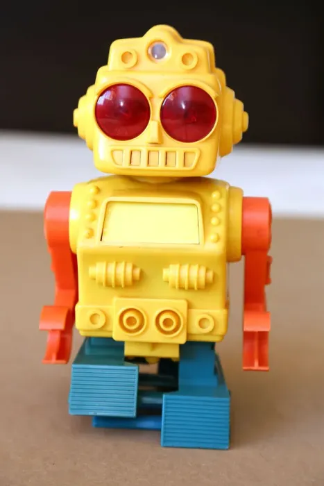 Framed Print : Retro Toy Walking Plastic Robot - Yellow Body (3 / 3) Framed Print : Retro Toy Walking Plastic Robot - Yellow Body (3 / 3)