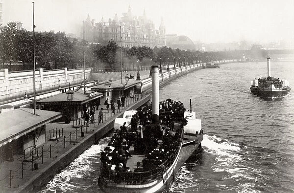 River Thames Embankment and steam launch, London