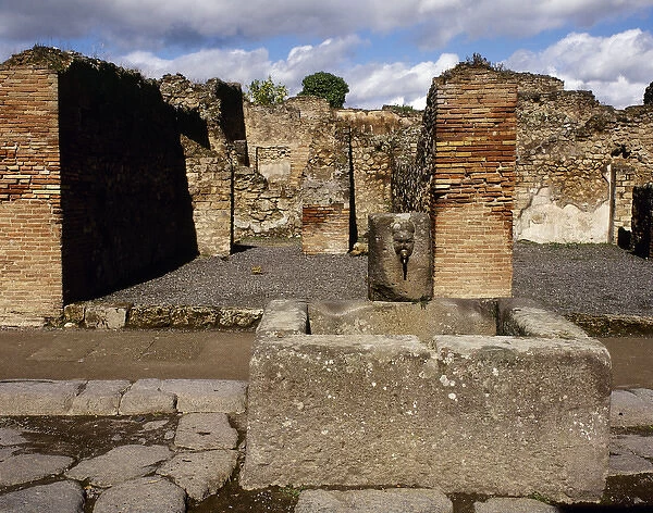 Roman art. Pompeii. Public fountain. Abundance path. Italy