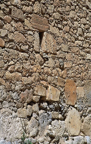 Roman remains in the facade of a house. Spain