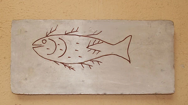 Roman tombstone depicting a fish. Plaster copy. After 4th cn