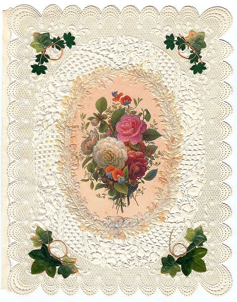 Roses and ivy on a greetings card with lacy white border