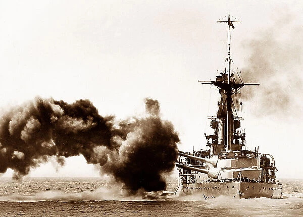 Royal Navy battleship firing a broadside