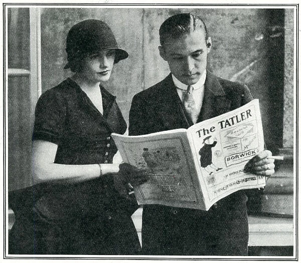 Rudolph Valentino reading The Tatler