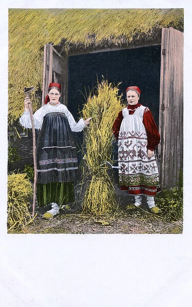 Two Rural Russian Country Girls pose with a sheaf of corn
