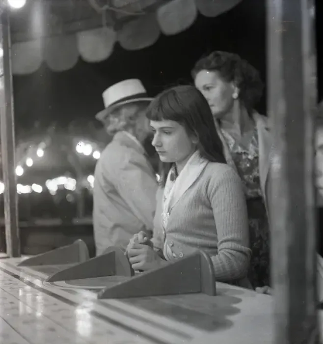 Framed Print : Sad-looking girl at the fair Framed Print : Sad-looking girl at the fair