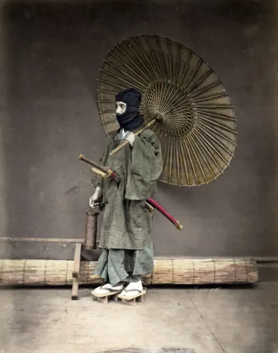 Framed Print : Samuari in winter clothes, and umbrella, Japan Framed Print : Samuari in winter clothes, and umbrella, Japan