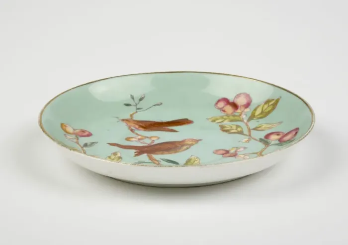 Framed Print : Saucer made from glazed hard-paste porcelain, decorated with a transfer-printed Framed Print : Saucer made from glazed hard-paste porcelain, decorated with a transfer-printed