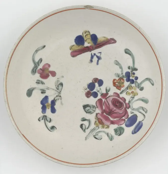 Framed Print : Saucer. Salt-glazed stoneware saucer, with overglaze enamel decoration of flowers in pink Framed Print : Saucer. Salt-glazed stoneware saucer, with overglaze enamel decoration of flowers in pink