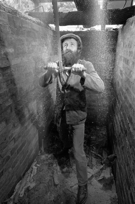 Framed Print : The bottom sawyer in a saw pit cutting a timber log into pla Framed Print : The bottom sawyer in a saw pit cutting a timber log into pla