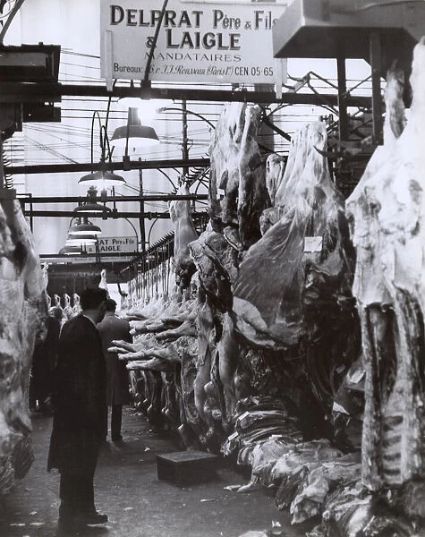 Scene in the meat market at Les Halles, Paris, France