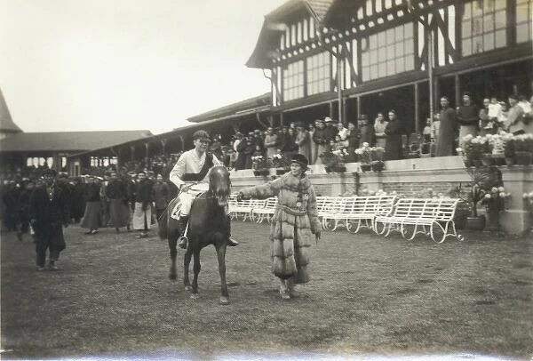Scene at a racecourse in the Far East