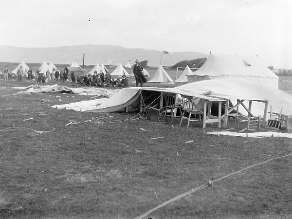 Scene on a shooting range, with collapsed tent