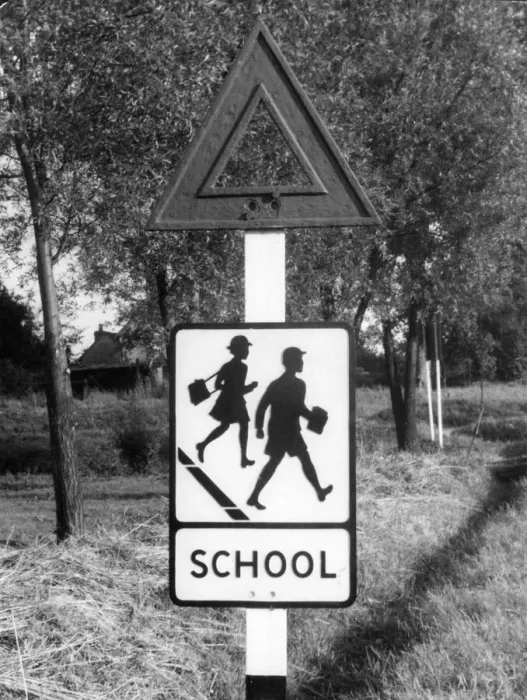 Framed Print : School - the pictorial traffic sign which replaced a former torch sign Framed Print : School - the pictorial traffic sign which replaced a former torch sign