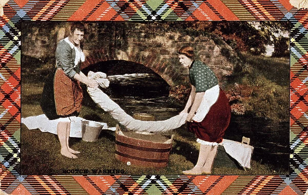 Two Scotswomen washing clothes by a river