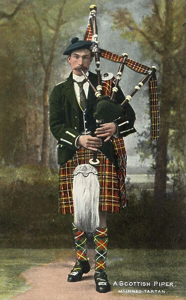 A Scottish Piper wearing McInnes Tartan