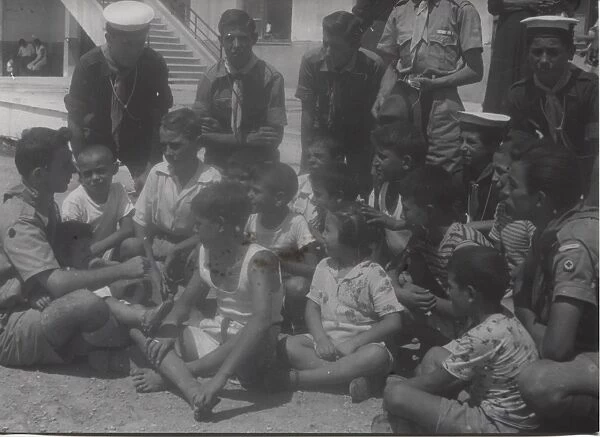 Scouts with earthquake victims in Patras, Greece