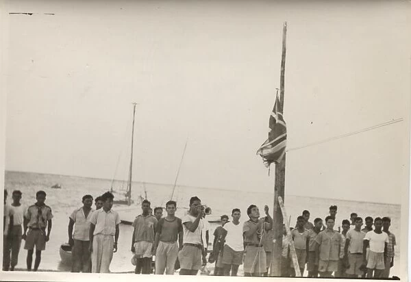 Scouts taking down colours, Bacalar, British Honduras