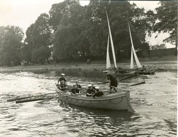 Sea Scouts rowing a whaler