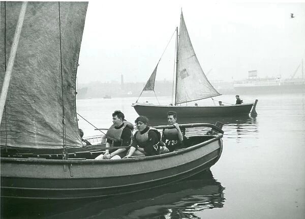 Sea Scouts sailing a cutter, London Docks
