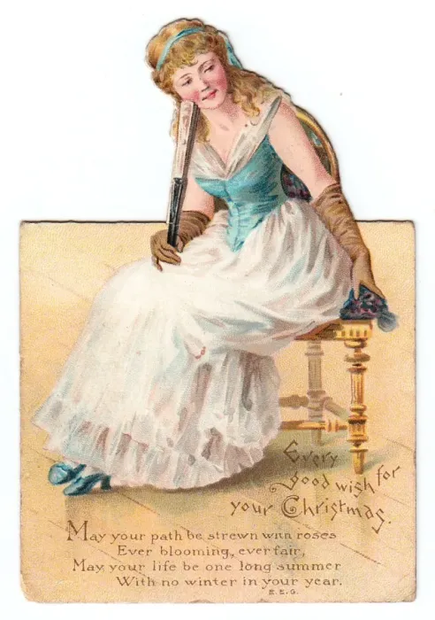 Framed Print : Seated woman with fan on a cutout Christmas card Framed Print : Seated woman with fan on a cutout Christmas card