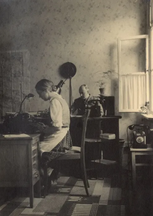 Framed Print : Secretary and soldier in an office, Braunschweig, Germany Framed Print : Secretary and soldier in an office, Braunschweig, Germany