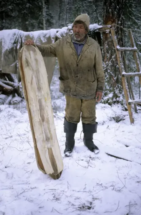 Framed Print : Selkup Man (North Siberia minority) shows his wooden Framed Print : Selkup Man (North Siberia minority) shows his wooden