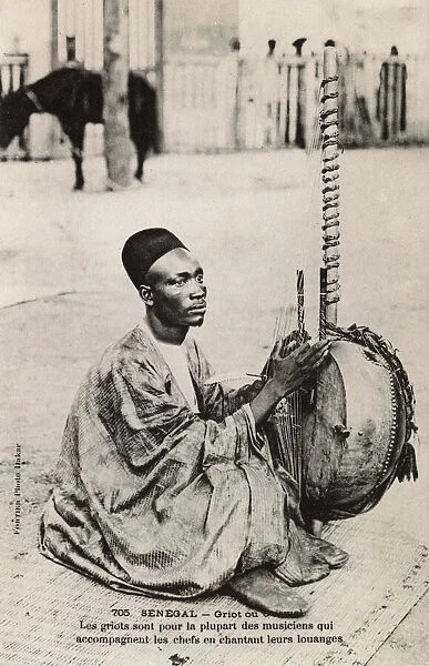 Senegal - Griot playing a Kora