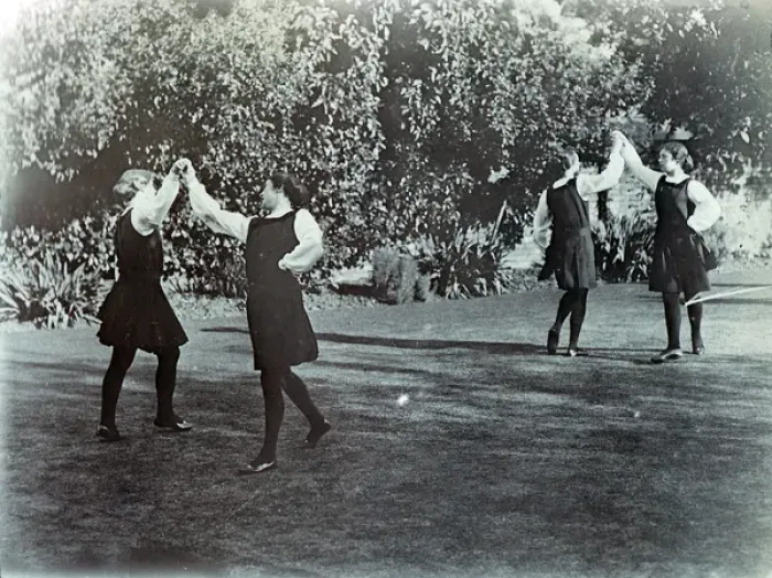 Framed Print : Four Seniors dancing in the garden Framed Print : Four Seniors dancing in the garden